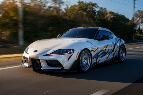 What role do electric charging networks play in the UK's automotive future?